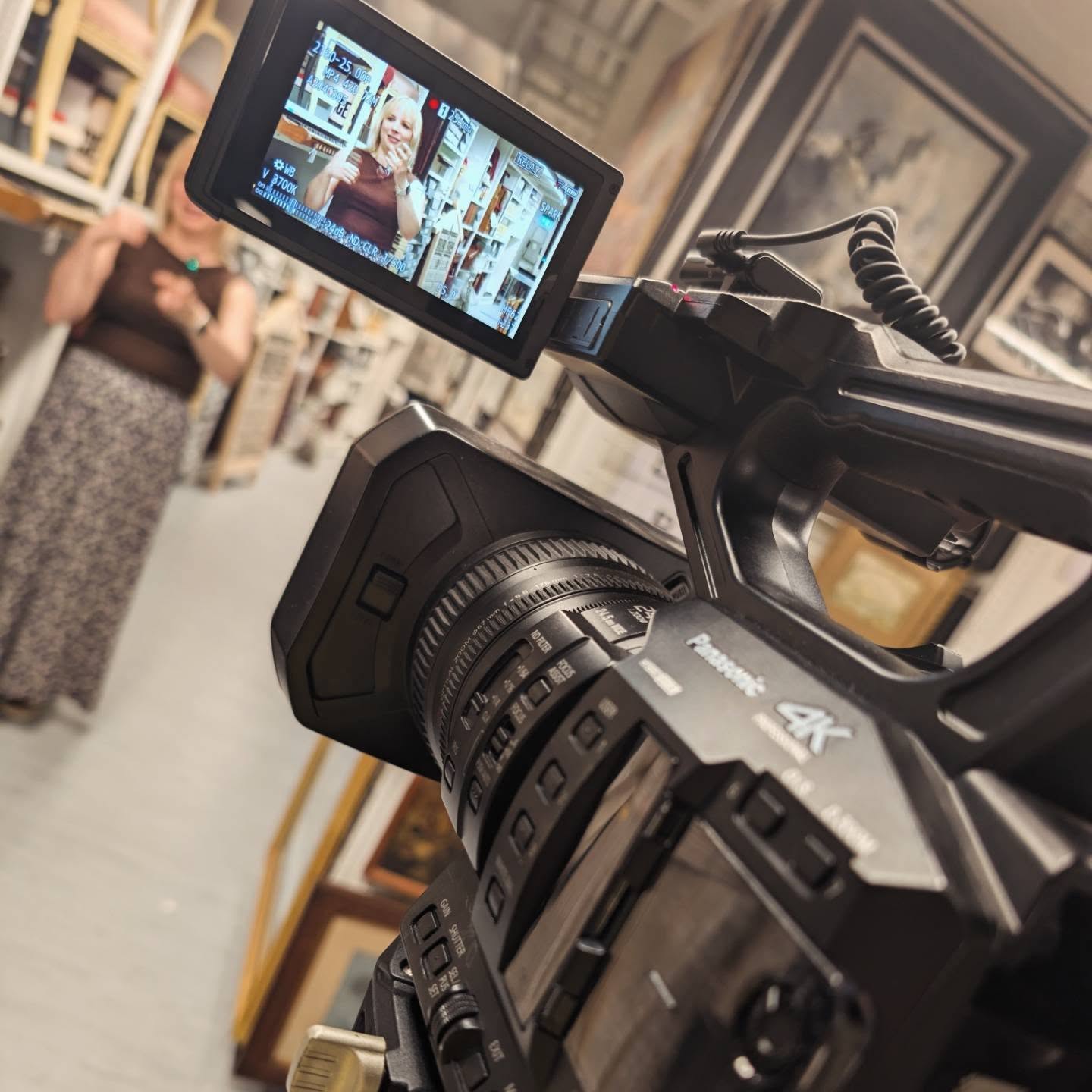 Camera and monitor set up to film an interview